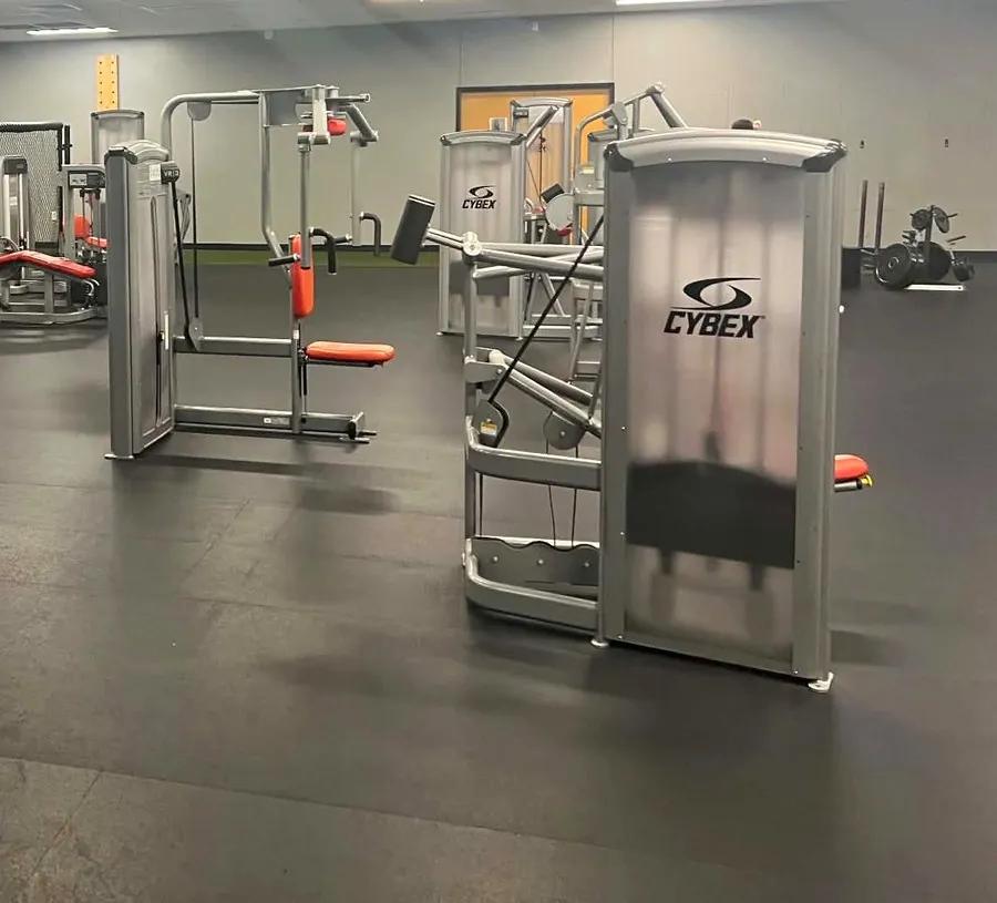 Strength machines on the gym floor at Valor Fit Society