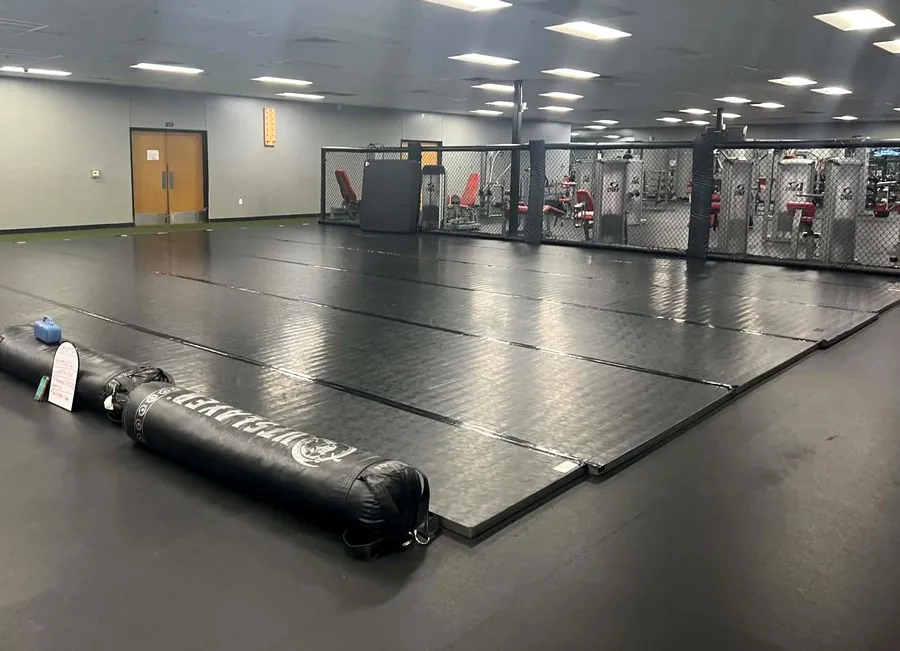 Heavy bags and the training mat area at Valor Fit Society