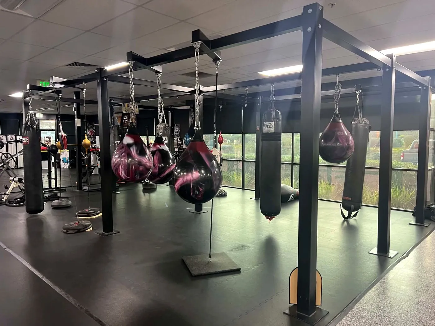 Heavy bags and boxing equipment at the Valor Fit Society gym